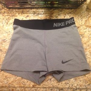 size small grey Nike pros