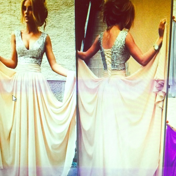 New chiffon, v neck, sequin top, lace up back.
