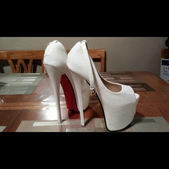 White, with red bottom stilletos