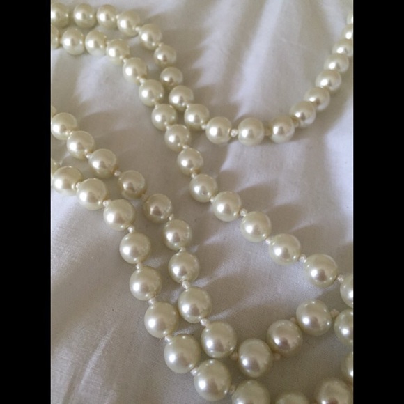 Long strand pearl necklace