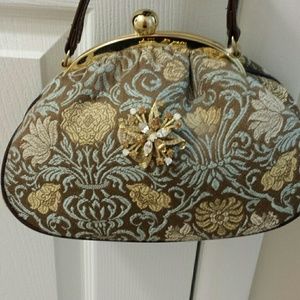 Brocade evening bag with broach