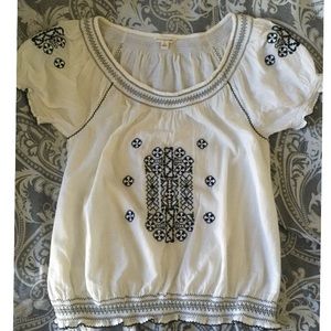 Off white American Eagle top with black design