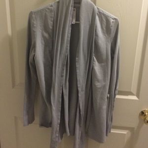 Long-sleeve grey sweater.