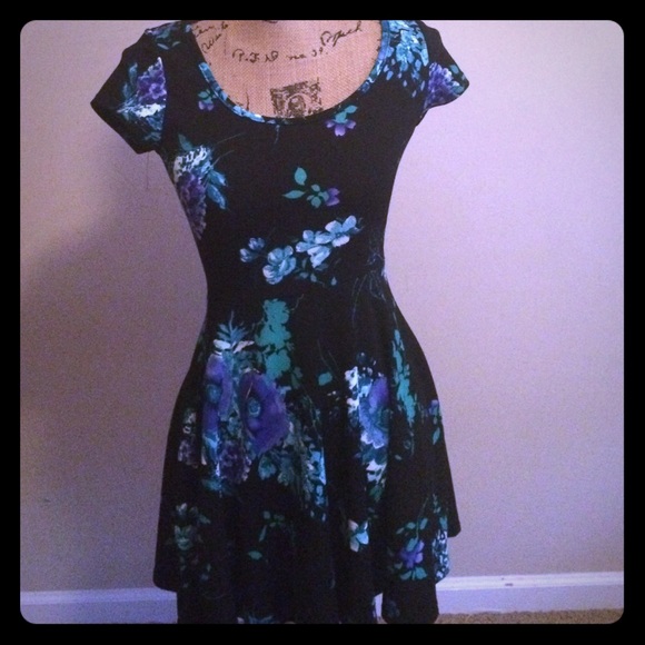 Black dress with flower print.
