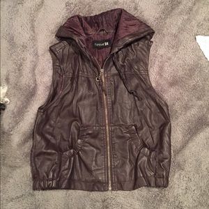 Fake leather vest.