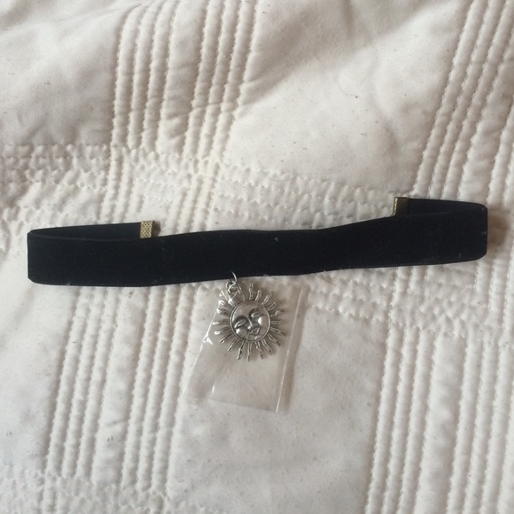 Wide black velvet chocker with sun charm