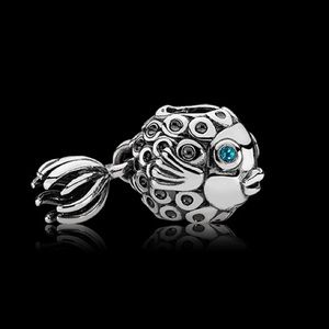 Fish charm with moving tail