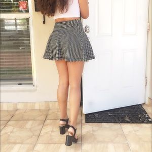 Black and white polka-dot skater skirt.