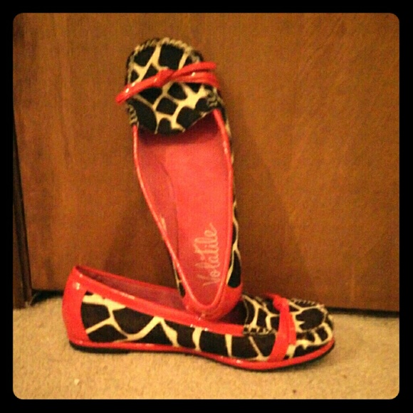 never worn cow-hide flats