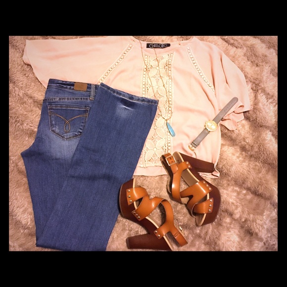 American rag faded blue jeans
