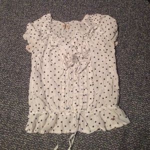 White Polkadotted shirt with ruffles in the front!