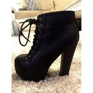 Black look a like Jeffrey Campbell boots!