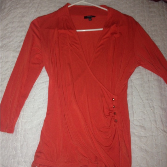Orange shirt with a crisscross style in the front - Picture 1 of 2