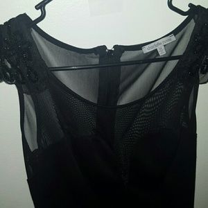 Black dress with mesh and shoulder detail