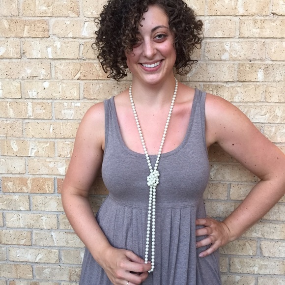 Extra long knotted strand of pearls