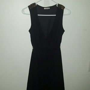 Black high low dress either gold stud shoulder