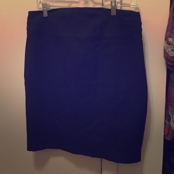 Black pencil skirt with buckle detailing.