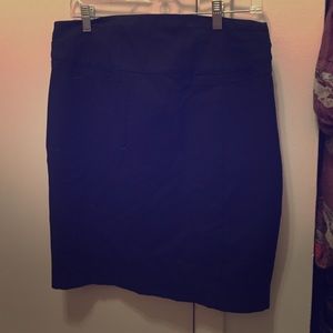 Black pencil skirt with buckle detailing.