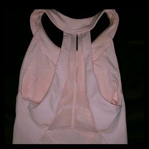 Lululemon pale, baby pink fitted top size 2