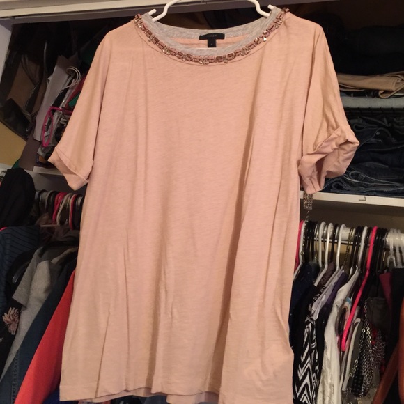 Super cute nude shirt with neckline embellishment