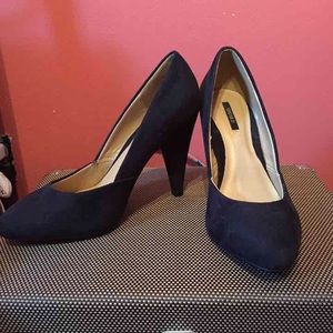 Black suede pumps
