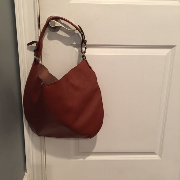 Genuine Leather Camel colored.