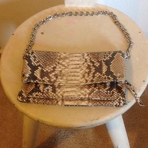 Henri Bendel small smooth snakeskin purse.