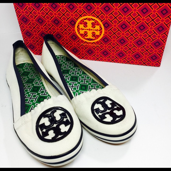 These are beautiful Tory Burch Sneakers. Size 8