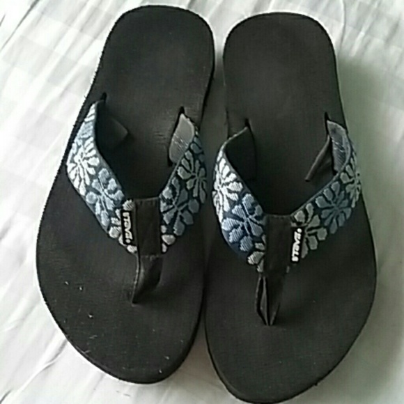 Blue and black teva sandals