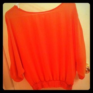 Reddish orange top