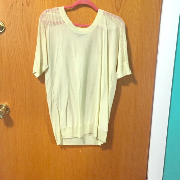 Pale yellow sweater