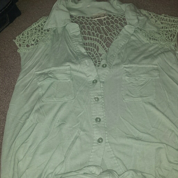 Super cute top with some lace and is mint green