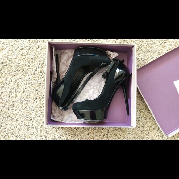 Baker black suede pumps