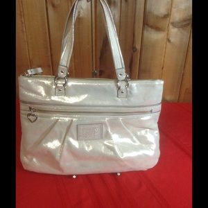 SOLD 100% authentic Coach Daisy tote/purse