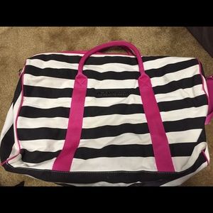 Victoria's Secret duffle bag.