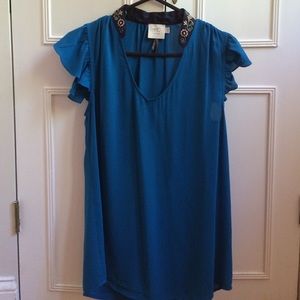 Beautiful blue tunic with ruffled sleeves
