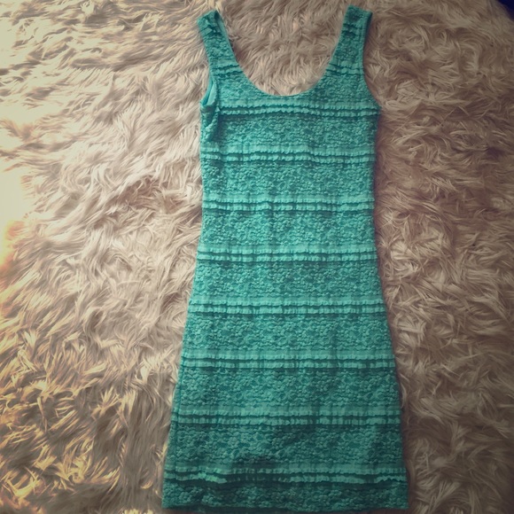 Turquoise blue body fitting dress
