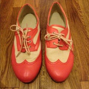 Coral and tan canvas Oxfords.