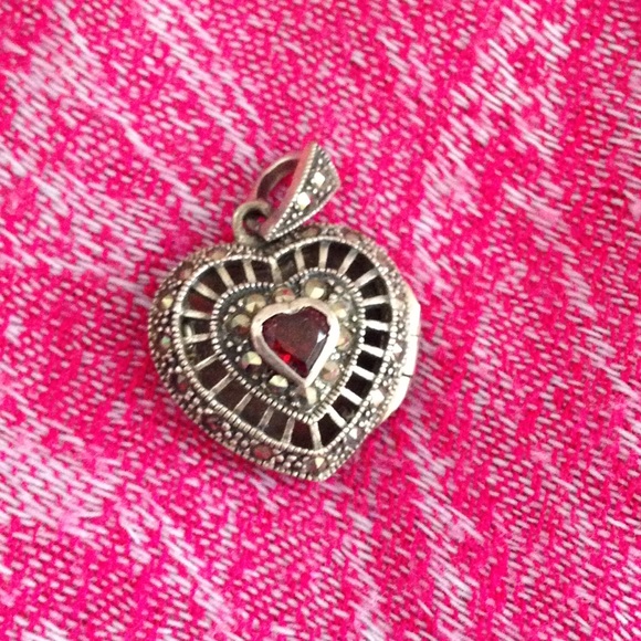 Silver marcasite locket with garnet!