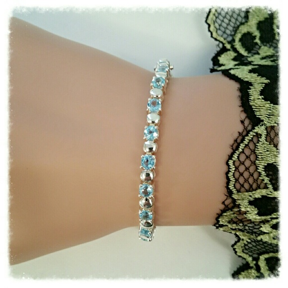Estate SS  Genuine Blue Topaz Tennis Bracelet
