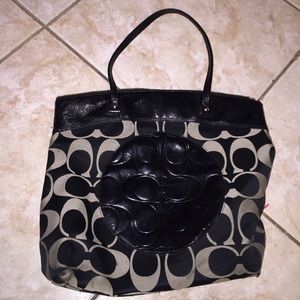 A black coach bag
