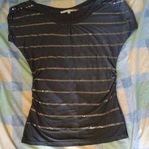 Blouse with silver/shiny material. Worn twice.