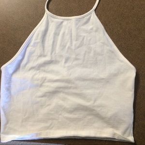 Cream colored self-tie halter crop top