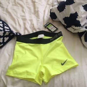Neon yellow Nike pro spandex