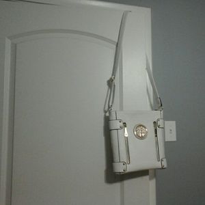 White, cross shoulder purse