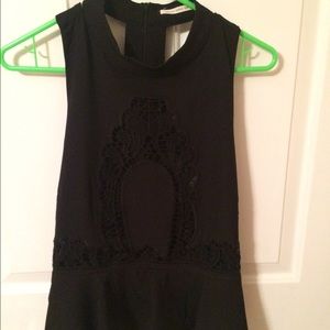Black peplum top with lace detail!