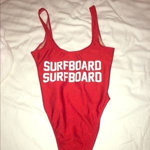 Private party red "surfboard surfboard" suit