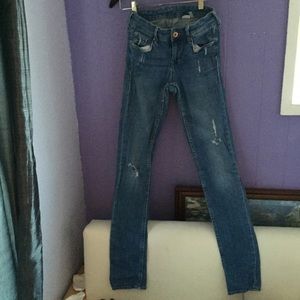 Medium Wash Ripped Skinny Jeans