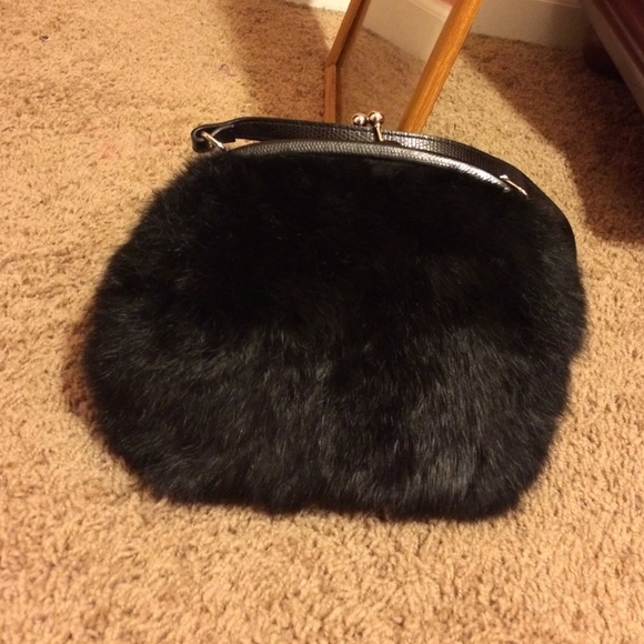 A black fur purse