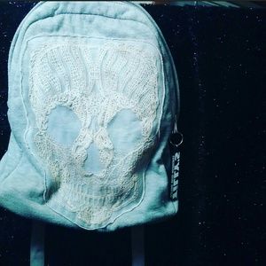 Skull embroidery backpack
